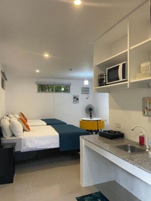 Bed sheets - Cozy Deluxe Suite in Lopez Beach Resort (Sipalay, Negros Occidental)