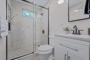 Hair dryer, towels, soap, shampoo