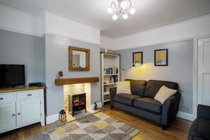 House | Living area | TV, fireplace - Stylish and Cosy Cottage in the Heart of Yorkshire (Leeds)