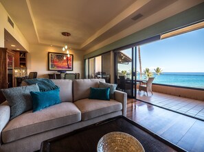 Apartamento, 2 habitaciones | Zona de estar | Una Smart TV