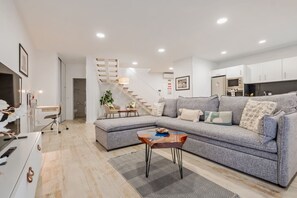 Basic Apartment, Multiple Beds | Living area | TV - Tanoeiros Residence by An Island Apart (Funchal)