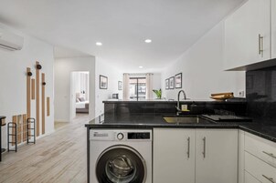 City Apartment, 1 Queen Bed with Sofa bed, Balcony | Private kitchen | Fridge, microwave, oven, stovetop