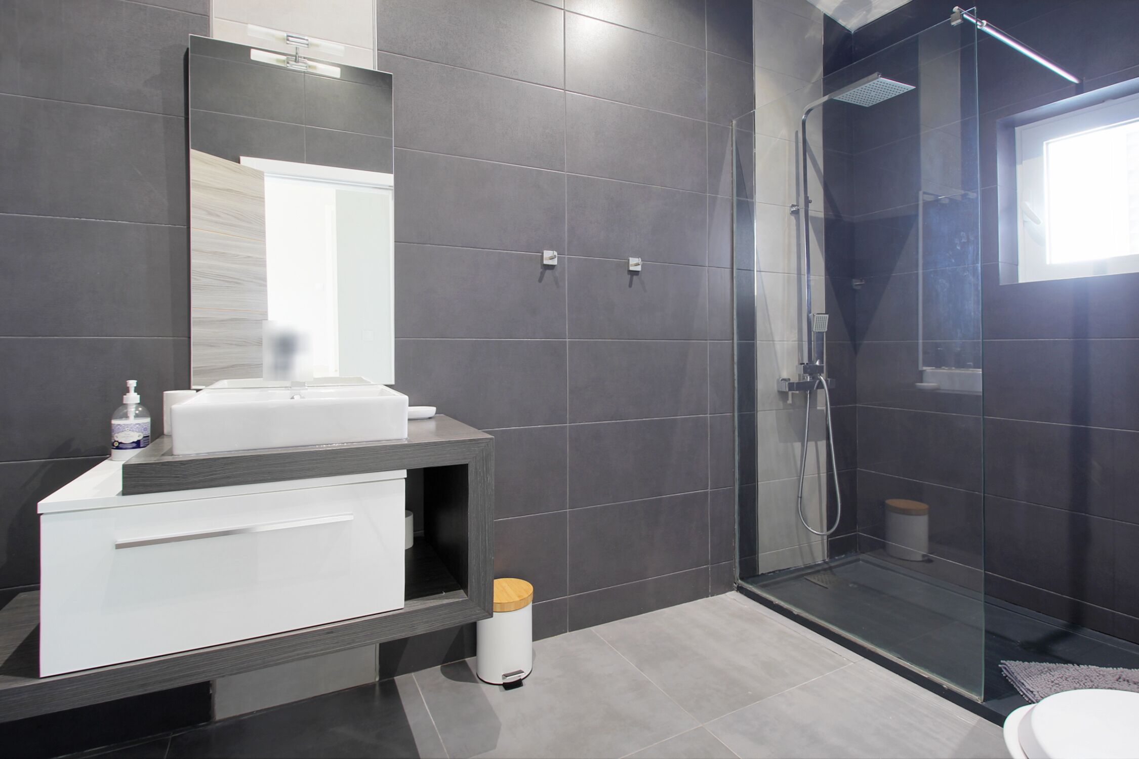 Shower, towels, soap, toilet paper