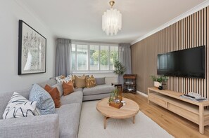 Apartment (2 Bedrooms) | Living area | 32-inch Smart TV with digital channels, TV