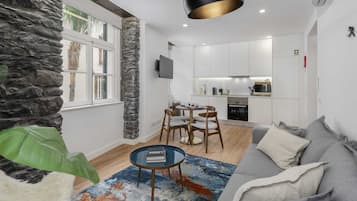 Basic Apartment, 1 Queen Bed with Sofa bed | Living area | TV