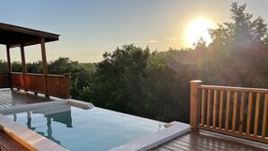 A wooden deck with a hot tub and a pergola. - Spacious 2 or 3 BR ocean side home with pool - private lot & panoramic views. (Utila)