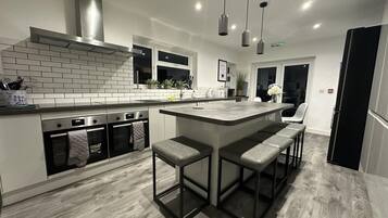 House, Multiple Beds | Private kitchen | Fridge, microwave, oven, stovetop