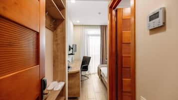 Economy Room, 1 Single Bed | 1 bedroom, in-room safe, desk, laptop workspace
