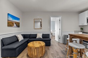Premium Suite, Multiple Beds, Refrigerator & Microwave | Living area | 36-inch flat-screen TV with premium channels