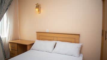 Habitación básica doble | Tabla de planchar con plancha y wifi gratis