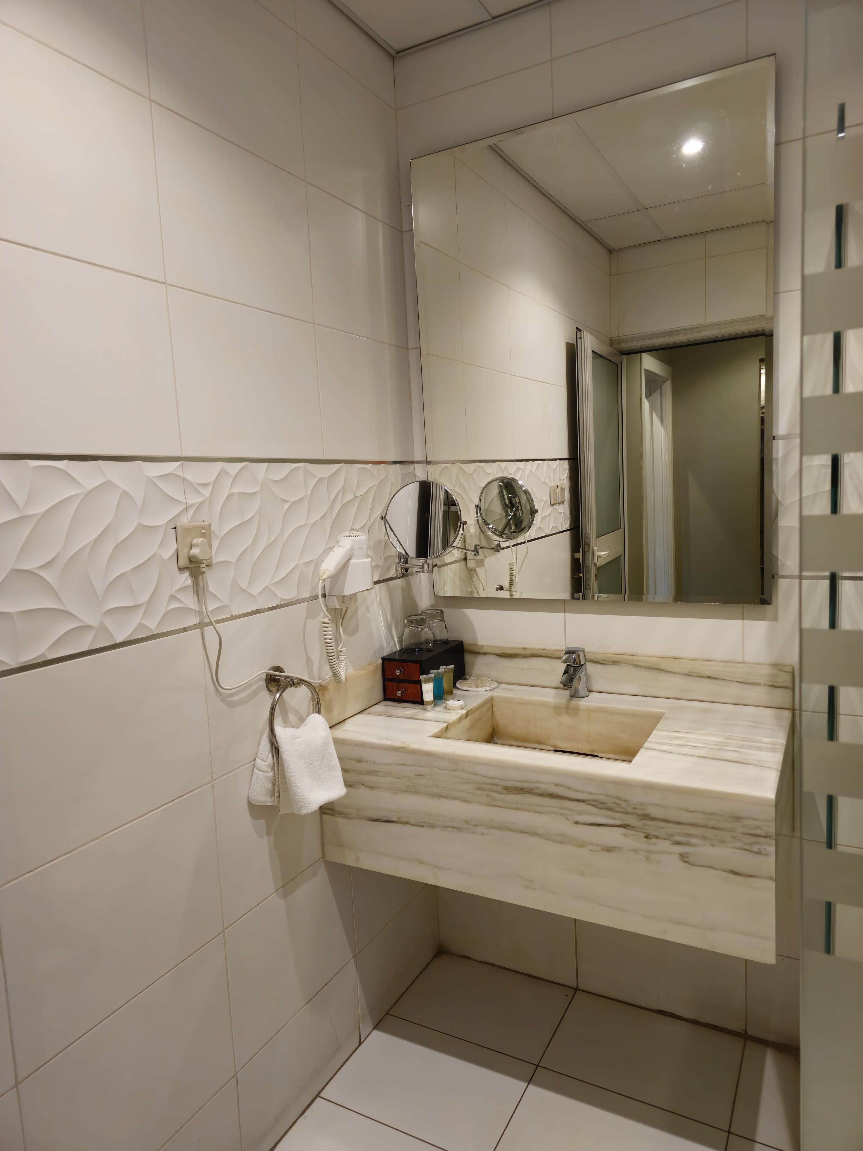 junior suite, 1 king bed | bathroom | separate bathtub and shower, rainfall showerhead, hair dryer, slippers