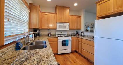 2-story, 3 bedroom modern home with king and queen beds, living room and kitchen.