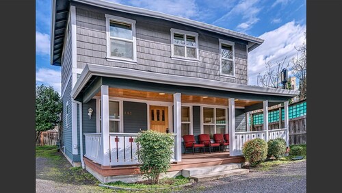 2-story, 3 bedroom modern home with king and queen beds, living room and kitchen.