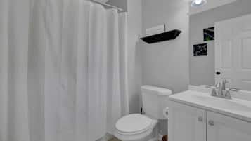 Hair dryer, towels, soap, shampoo