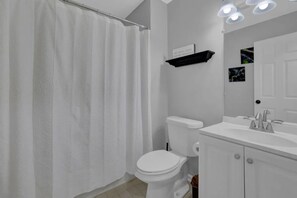 Hair dryer, towels, soap, shampoo