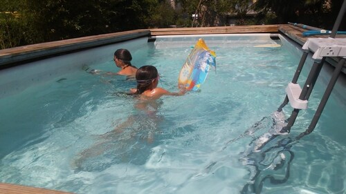 Appartamento Raffaello in riva al lago con giardino e piscina