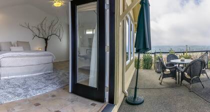 Cottage offers a sectional sofa, chef's kitchen and open floor plan.