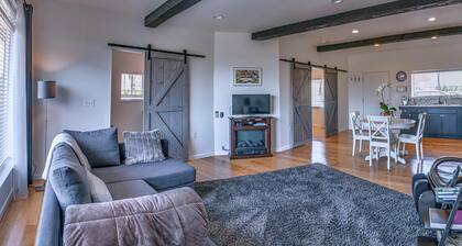 Cottage 1 offers a king-sized bed, dining area, full kitchen, hot tub.