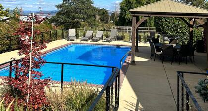 1 bedroom with a king-size bed, one bathroom, and kitchenette.