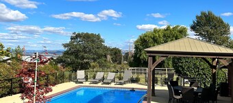 1 bedroom with a king-size bed, one bathroom, and kitchenette.