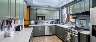 Anne Hathaway, 8 bedrooms, 9 bathrooms, a commercial kitchen and dining room.