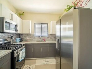 Fridge, microwave, oven, stovetop