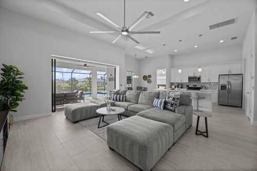 Cape Coral Dream - 4 bedroom/3 bath, heated pool home with waterfront view