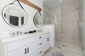 Bathtub, hair dryer, towels, soap