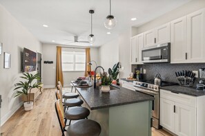 Apartment | Private kitchen | Full-size fridge, microwave, oven, stovetop