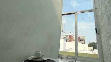 Suite estudio urbana | Área de sala de estar