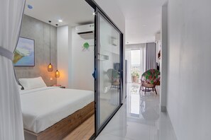 Deluxe Apartment, Balcony | 2 bedrooms, desk, laptop workspace, iron/ironing board