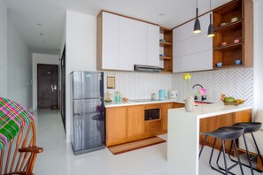 Deluxe Apartment, Balcony | Private kitchen | Fridge, microwave, electric kettle, rice cooker
