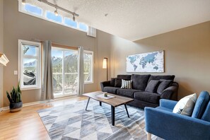 TV, fireplace, stereo - Cozy Condo | Epic Mountain Views | Parking Garage | Central | Air Conditioning (Canmore)