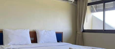 Quarto com design assinado | 1 quarto, escrivaninha, espaço de trabalho para notebook