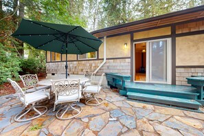 Outdoor dining - Tree-lined retreat with wood fireplace, board game collection, & pool access (Shelton)