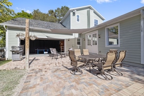 Outdoor dining - Best-Priced Palm Harbor Retreat | Heated Saltwater Pool, Games & Beach Gear Included (Palm Harbor)