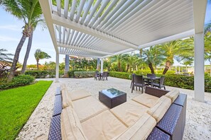 Outdoor dining - Ocean View Condo at Le Vent 402 by Bocobay (Noord)