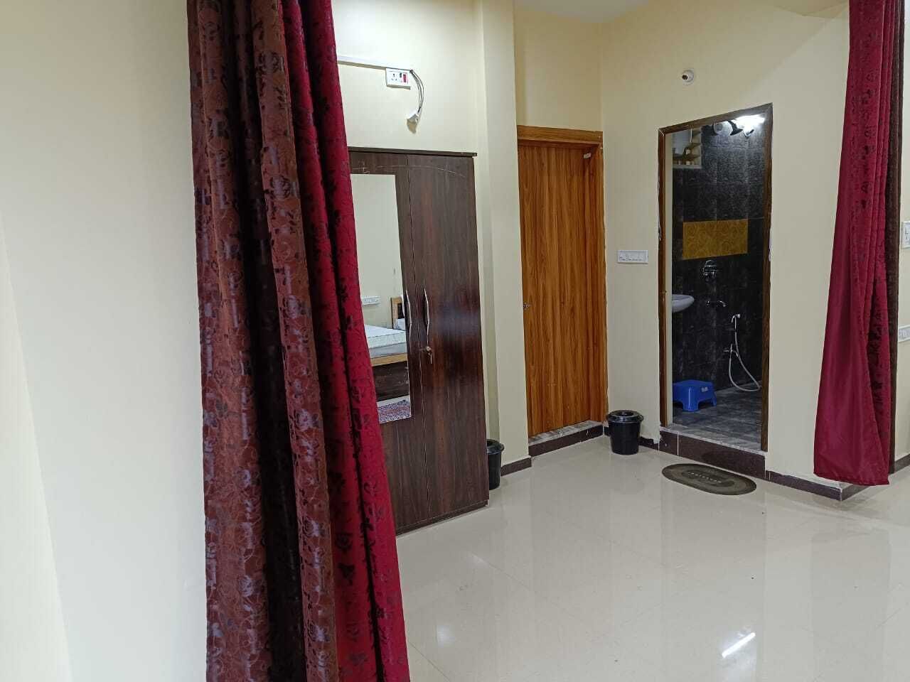 Regadera, secadora de cabello, bidet, toallas 