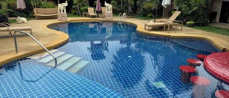 Outdoor pool, pool umbrellas, sun loungers