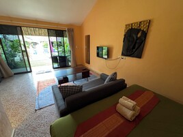 Habitación Confort doble, 1 cama doble, vistas al jardín | Minibar, caja fuerte, decoración individual y mobiliario individual