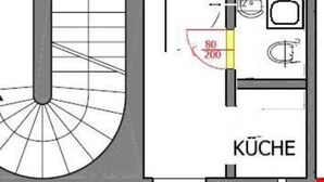 A hotel room layout with a kitchenette, a bathroom, and a staircase leading to the top floor. - Studio Apartment near Reumanplatz (Vienna)