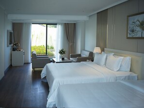 Deluxe Triple Room | Minibar, in-room safe, desk, laptop workspace - MERPERLE DALAT HOTEL (Da Lat)