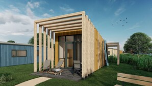 Un espace de vie extérieur moderne, doté d’une pergola en bois, de sièges et offrant une vue sur le ciel.