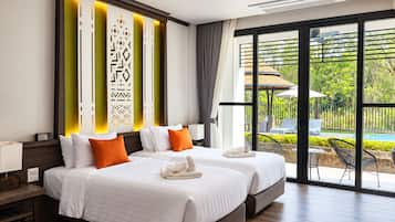A hotel room with two beds, a large window, and a view of the outdoor pool area.