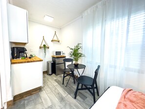 Interior - Affordable studio with 2 queen beds in a shared complex. Enjoy a pool, BBQ area, game zone, and more (Clearwater)