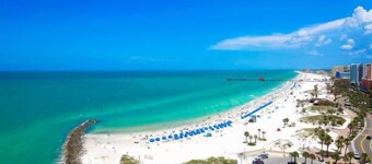 Affordable studio with 2 queen beds in a vibrant shared complex