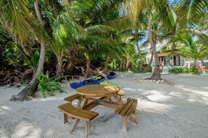 Outdoor dining - "EagleRay" Beachfront Cabin @ NorthBeachRetreat (San Pedro Town)