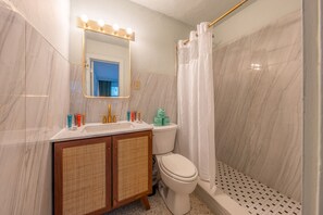 Shower, hair dryer, towels
