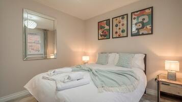 3 bedrooms, desk, iron/ironing board, travel cot