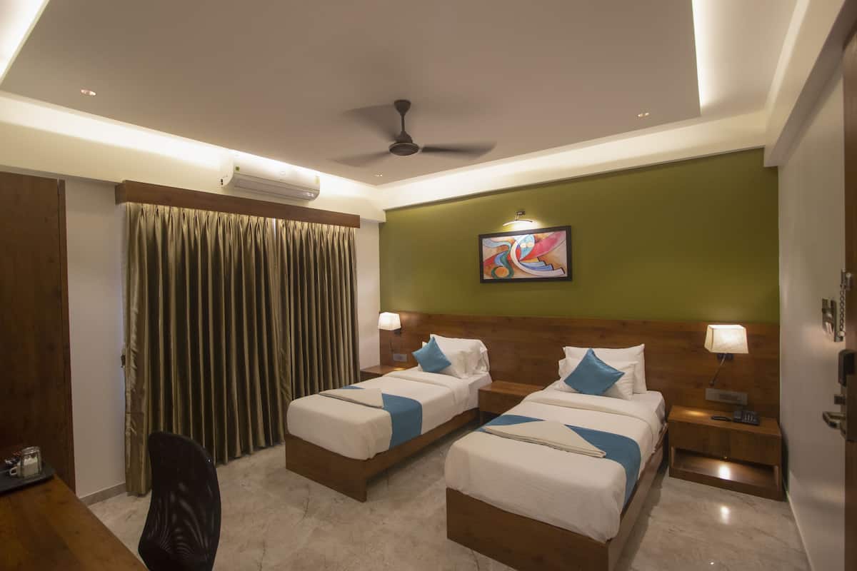 Habitación Deluxe con 2 camas individuales | Wifi gratis y ropa de cama